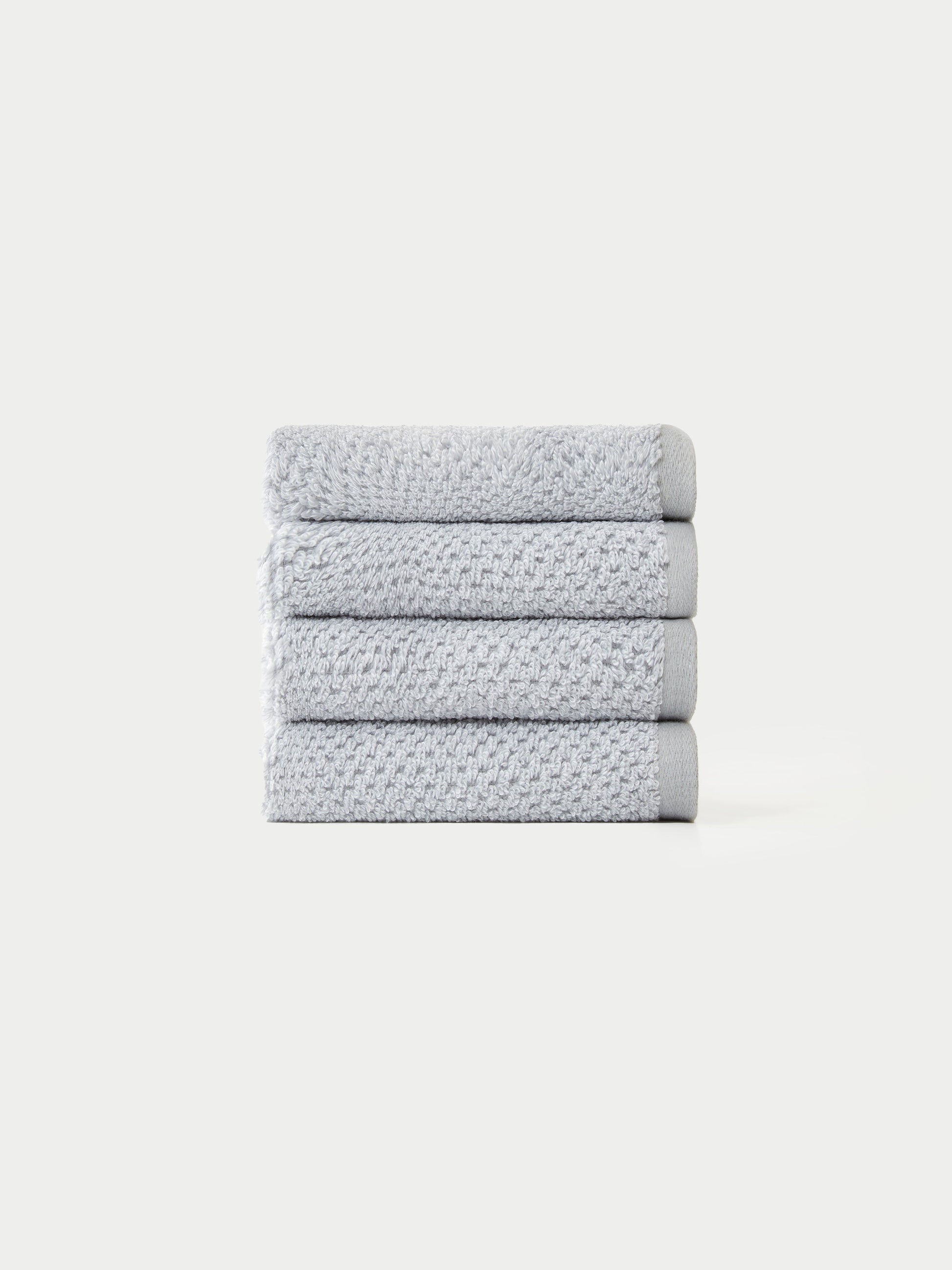 Nantucket Wash Cloths in the color Heathered Harbor Mist. The Wash Cloths are neatly folded. The photo of the wash cloths was taken with a white background.|Color:Heathered Harbor Mist